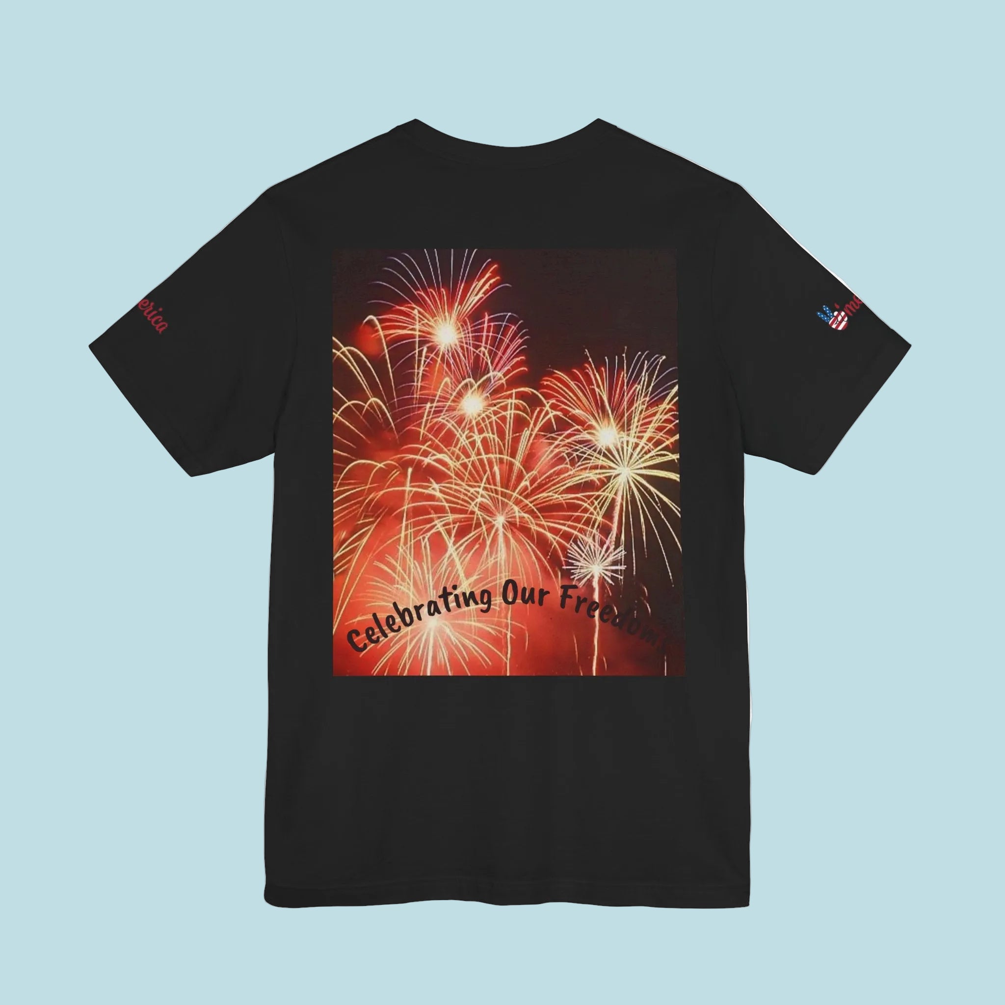 Black t-shirt with a colorful fireworks design and 'Celebrating Our Freedom' - 100% cotton