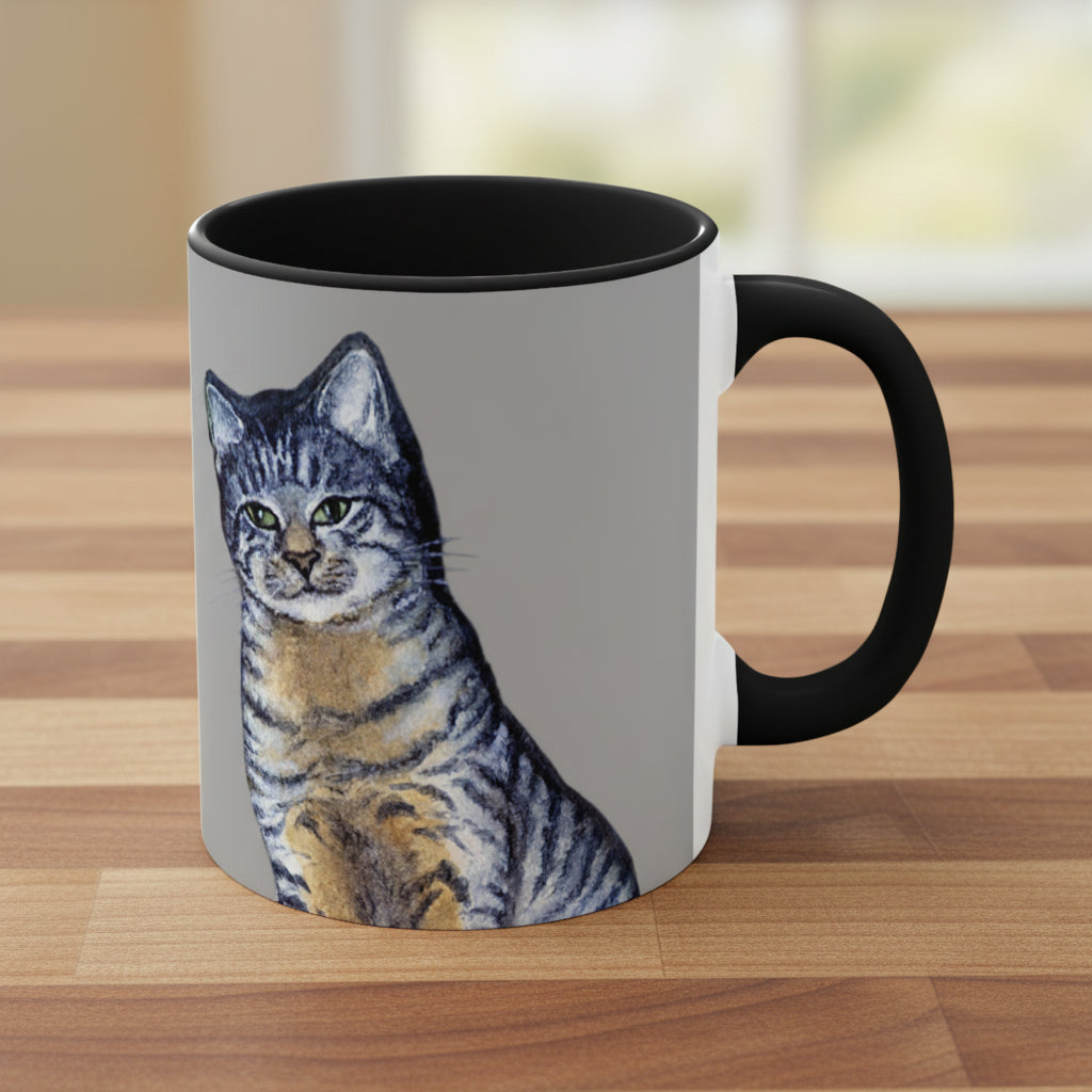 Mug with a tabby cat illustration on a gray background
