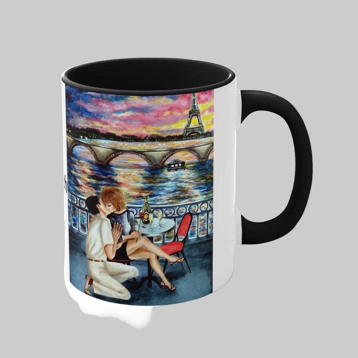 Mug with a romantic scene of a couple by the Eiffel Tower at sunset with black accents