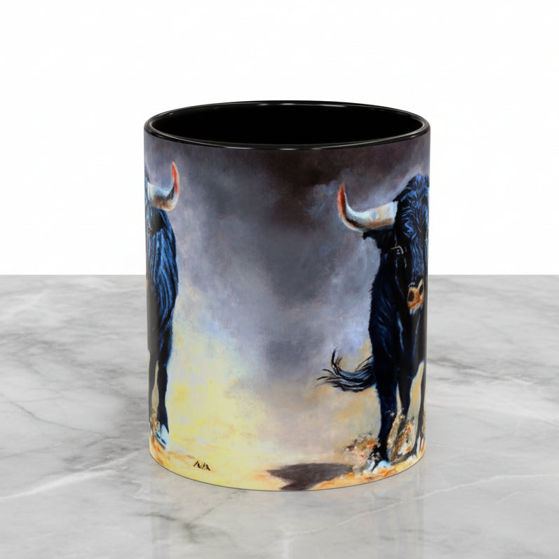 A cylindrical ceramic mug with a wrap-around a black blue bull against a smoky gray and yellow background, featuring a solid black center stripe and black interior and handle.