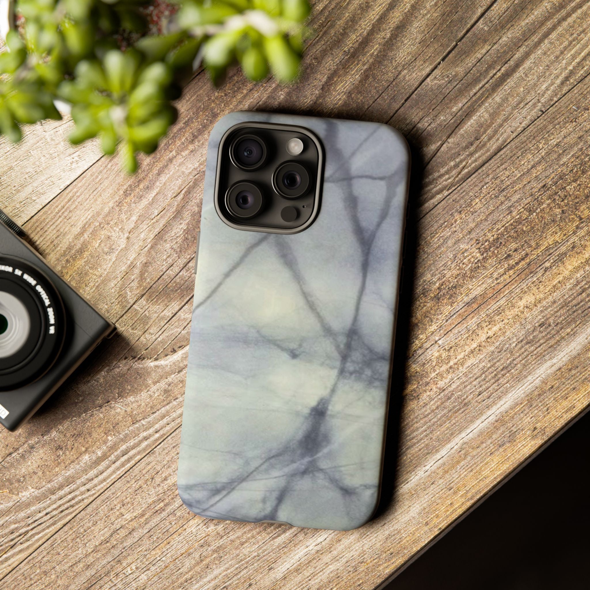 Phone case in impressive grey marble design with shock absorbing dual layer shell and UV resistance in 3D wrap