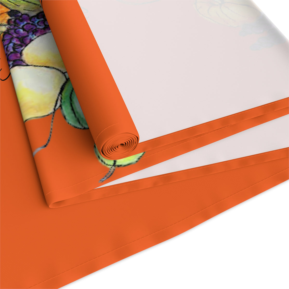 Orange Cornucopia Table Runner rolled up 