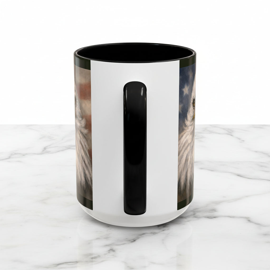 A white ceramic mug with a black handle and black interior, featuring a printed graphic of an Eagle on both sides against a patriotic American flag background.