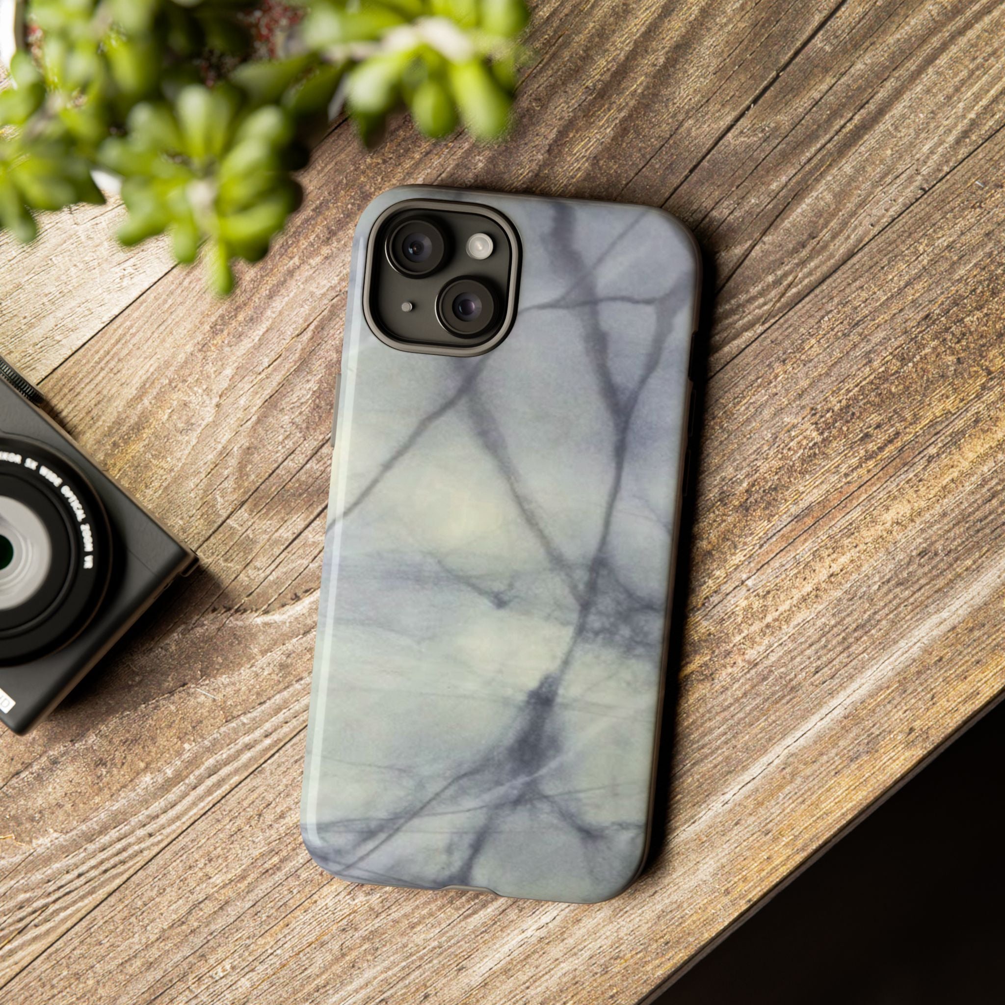 Phone case in impressive grey marble design with shock absorbing dual layer shell and UV resistance in 3D wrap
