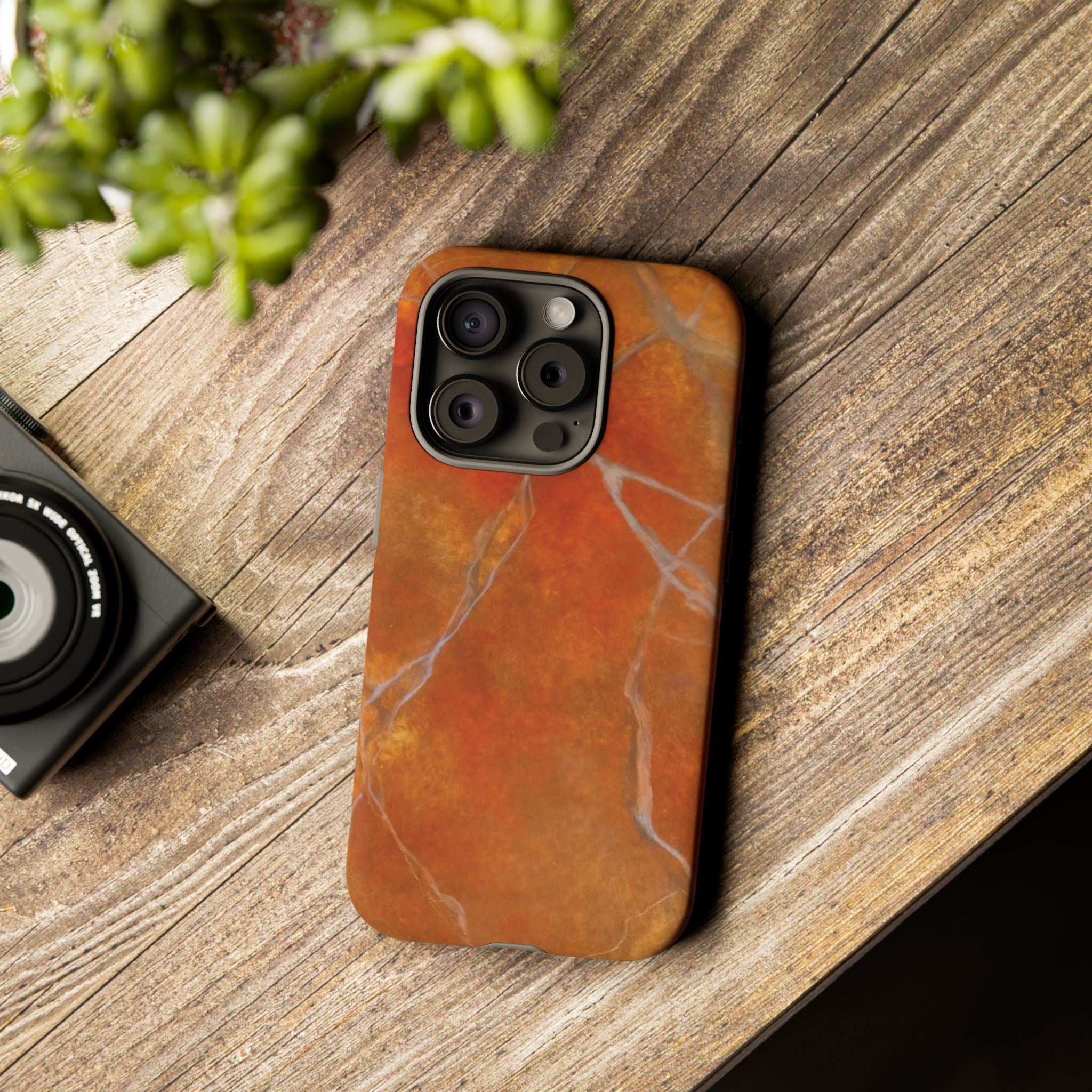 Phone case in sophisticated red orange marble design that is impact resistant tough in glossy or matte finish