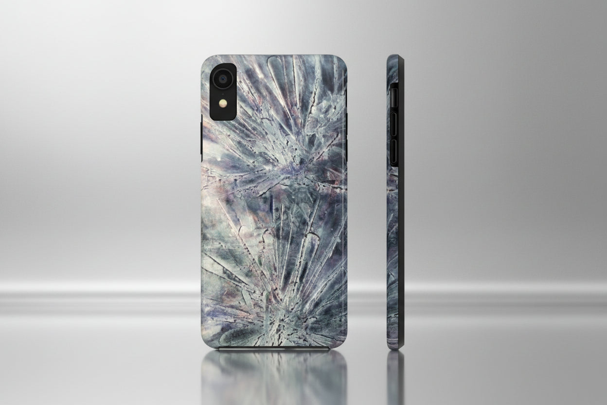 Phone case in abstract bursts of silver crystal design with rubber lining for strong impact and UV protection