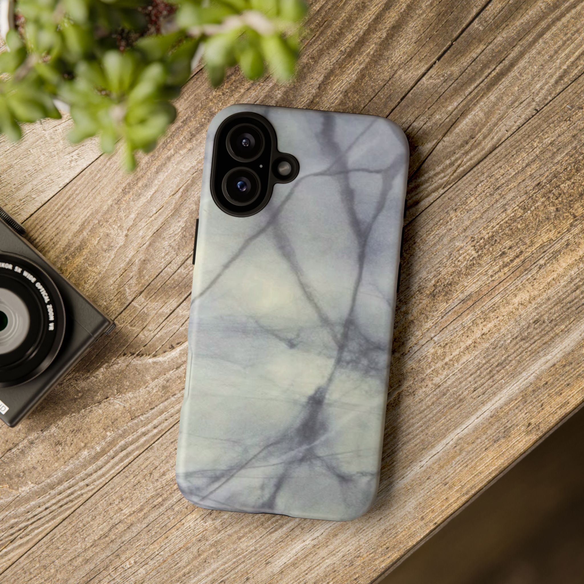 Phone case in impressive grey marble design with shock absorbing dual layer shell and UV resistance in 3D wrap