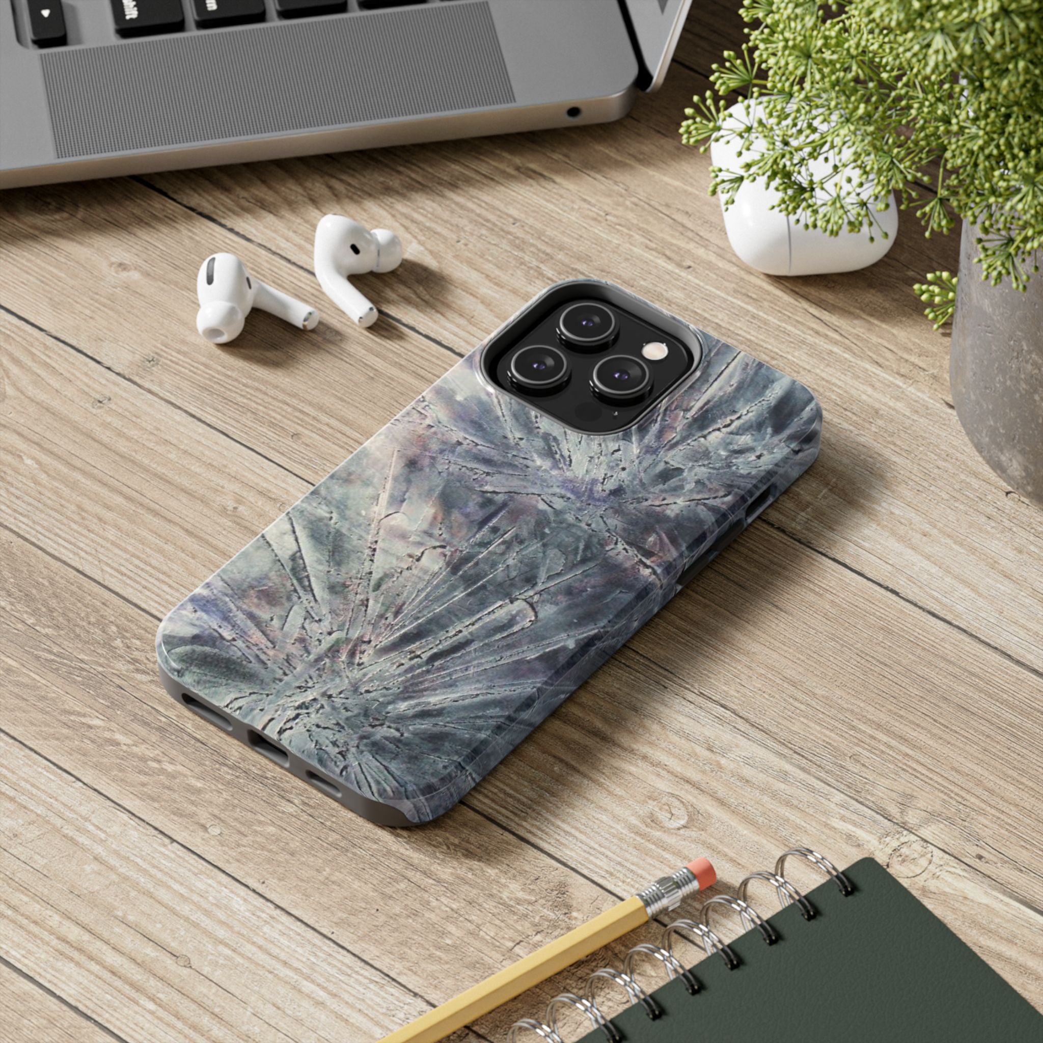 Phone case in abstract bursts of silver crystal design with rubber lining for strong impact and UV protection