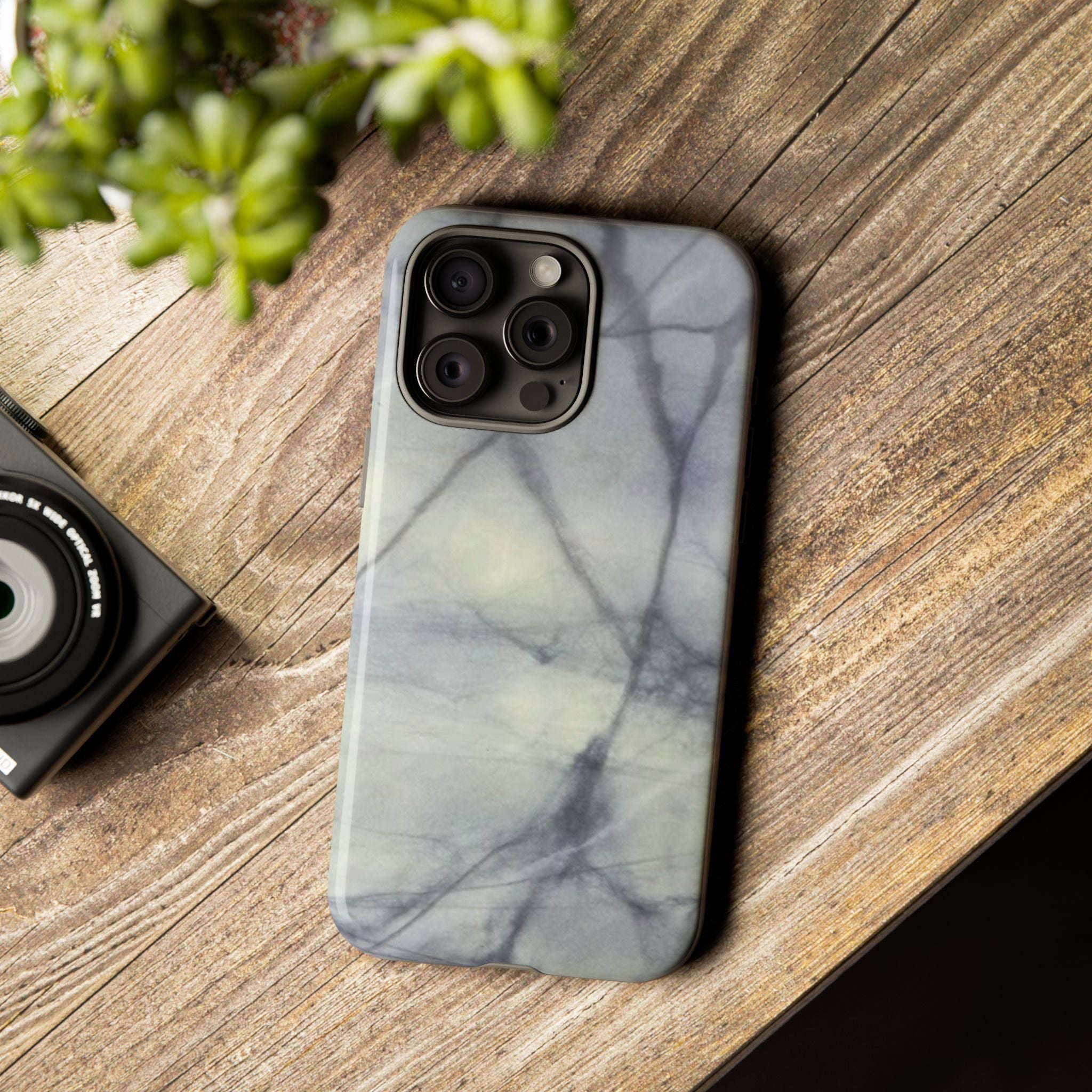 Phone case in impressive grey marble design with shock absorbing dual layer shell and UV resistance in 3D wrap