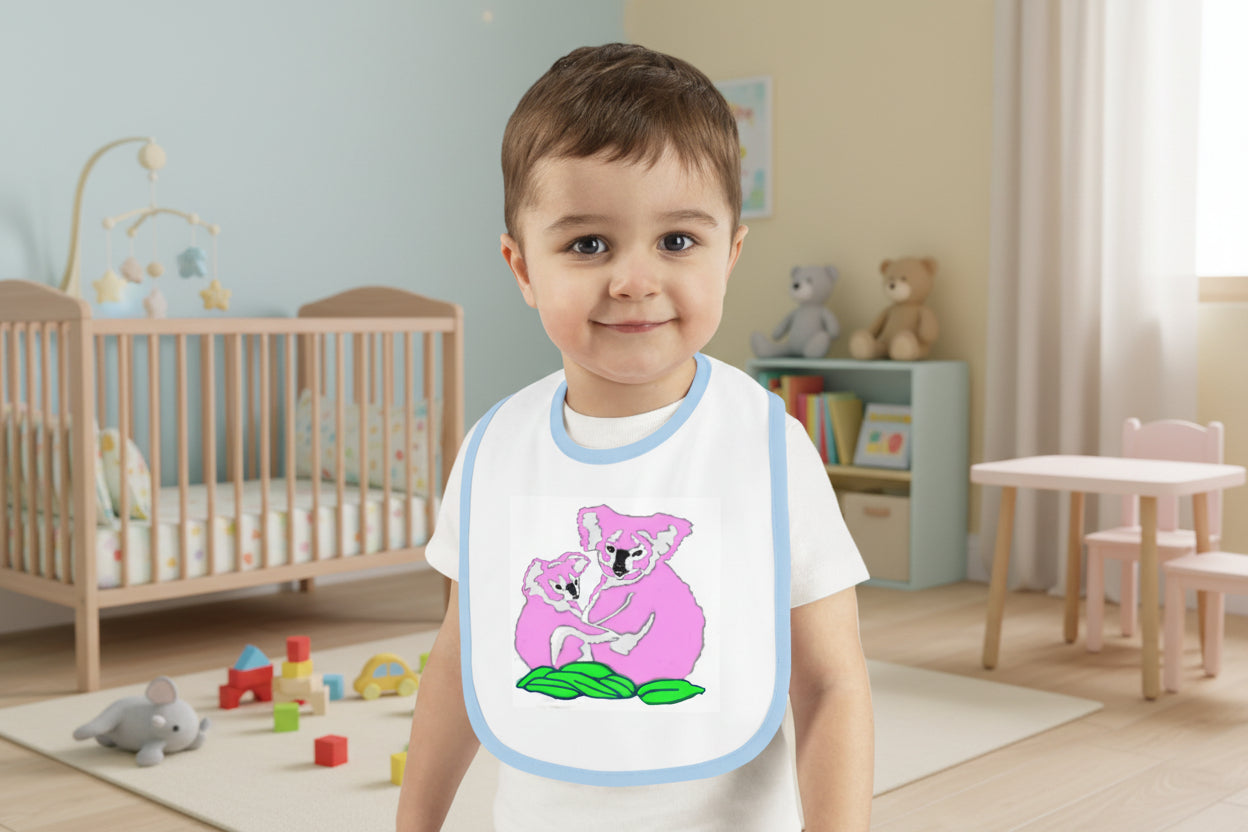 Baby and Toddler Bib with a pink koala design on a white background