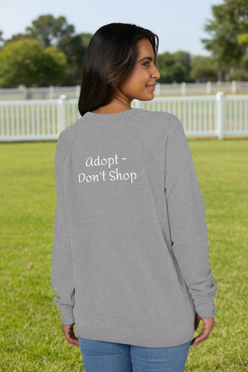 Unisex graphite heather raglan shirt with 'adopt don't shop' text on the back.