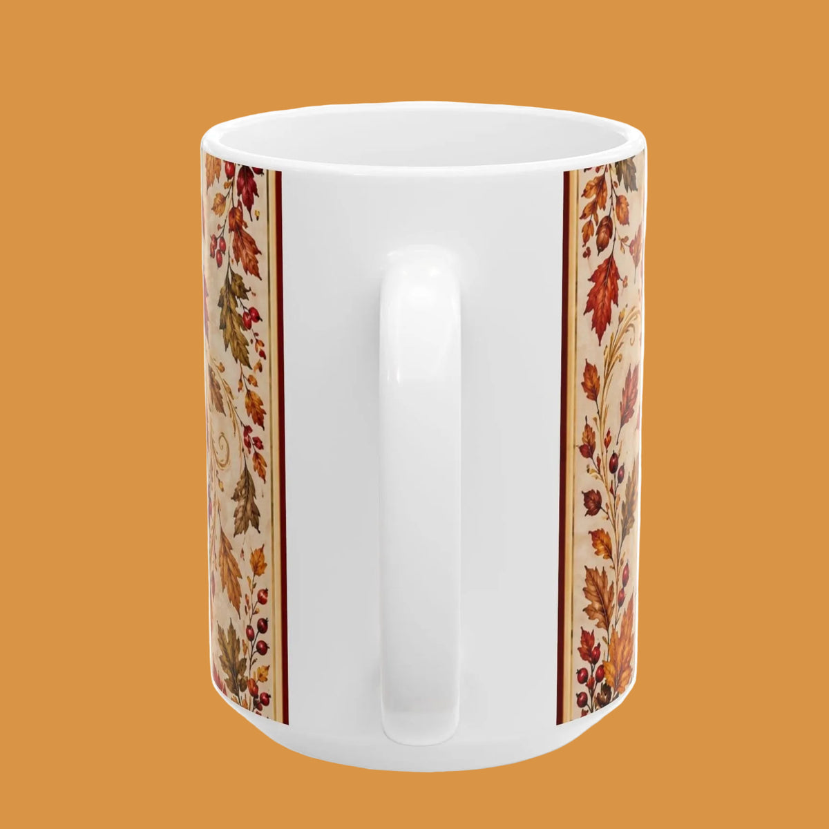 A white ceramic mug with a vertical autumn-themed botanical pattern featuring red, orange, and yellow leaves on a cream background