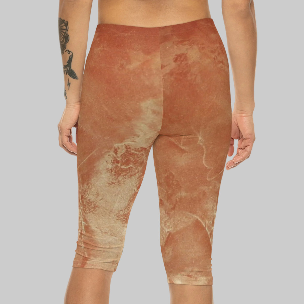 Women's capri leggings with an abstract terracotta and cream in abstract design - back view