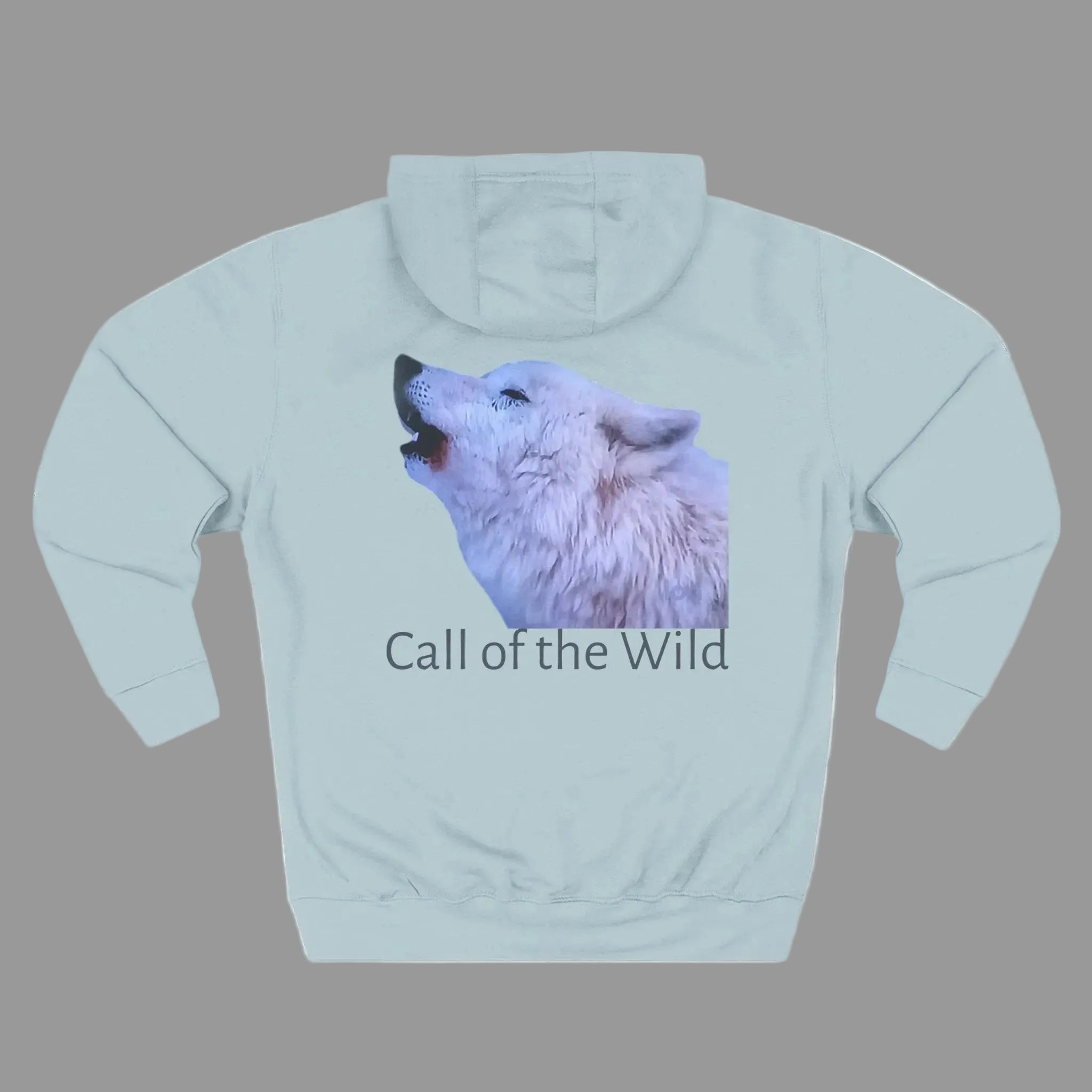 A Blue Mist hoodie pullover shown from the back, featuring a graphic print of a howling white wolf - text 'Call of the Wild' to keep you warm for the Fall