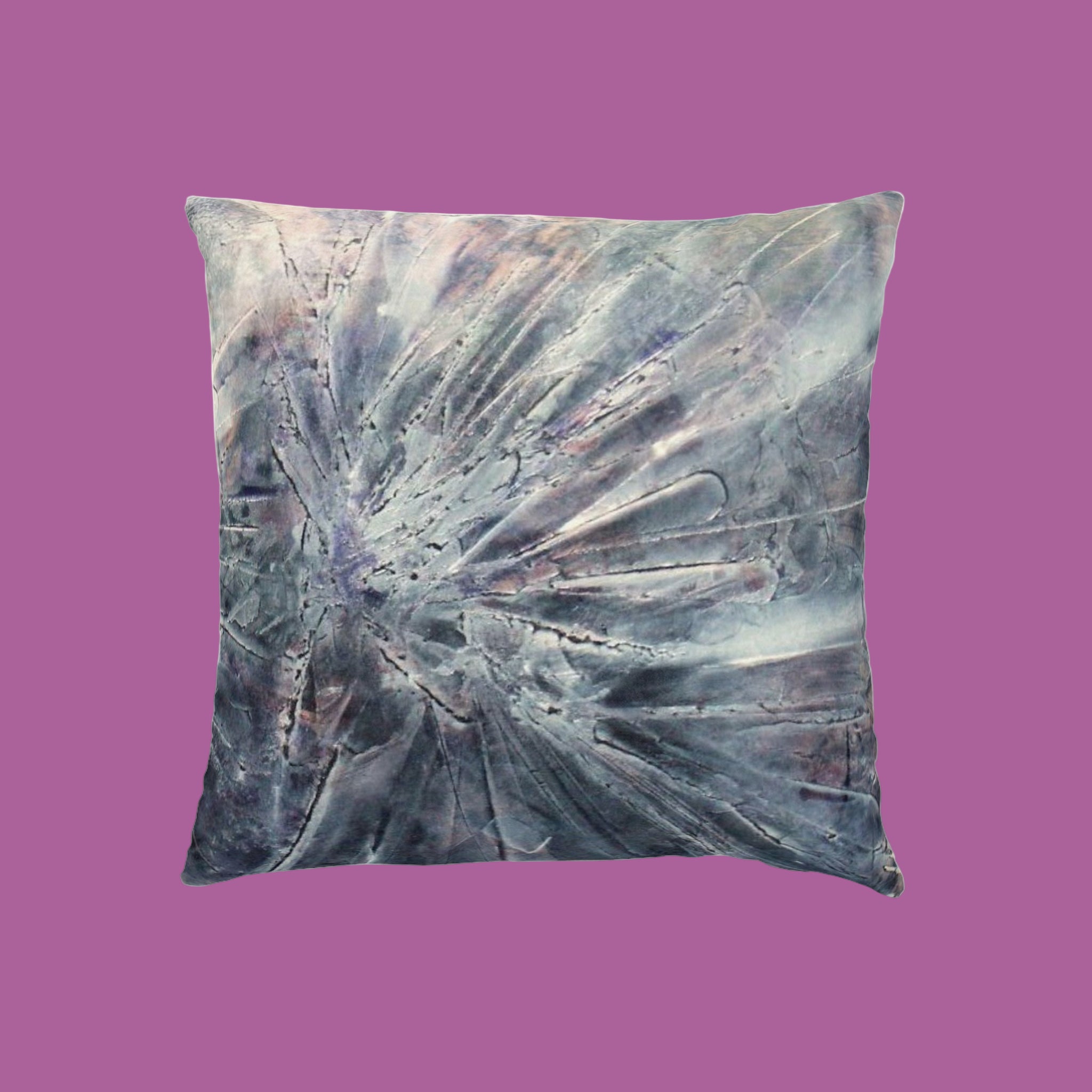 Decorative pillow with abstract design in silvers and greys