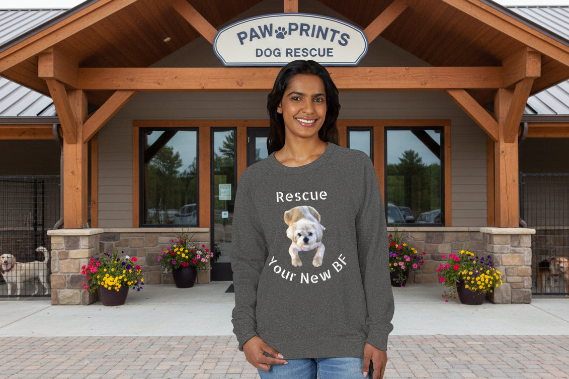 Woman wearing a charcoal heather raglan shirt with a dog graphic and text - Relaxed Fit S-3XL