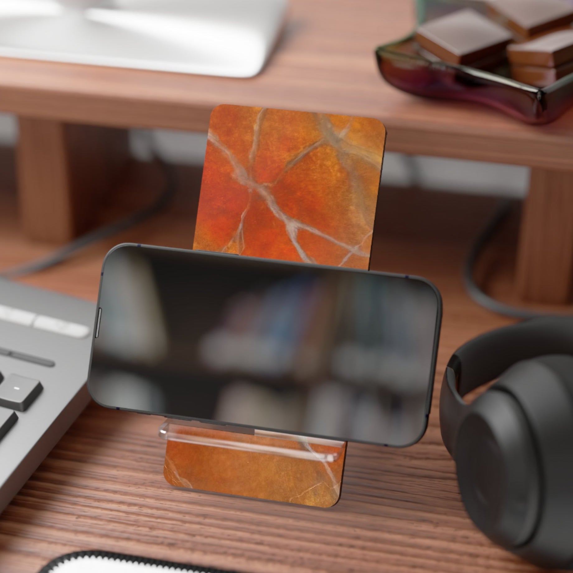 Phone on a amazing red orange marble design display stand 