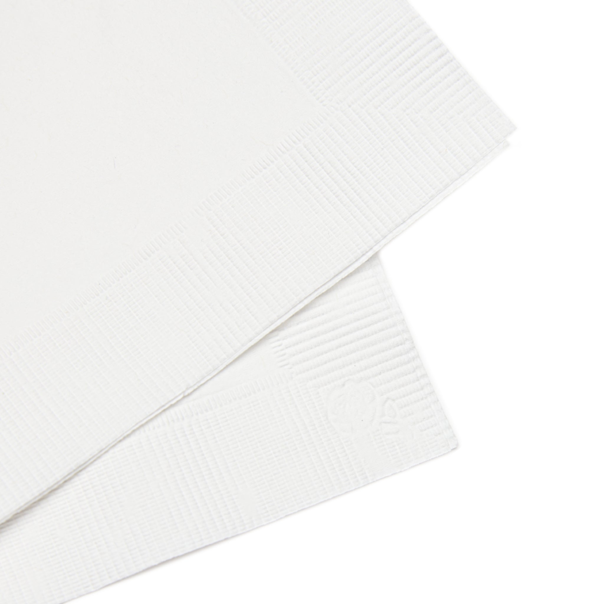 Close-up of white textured napkin on a white background