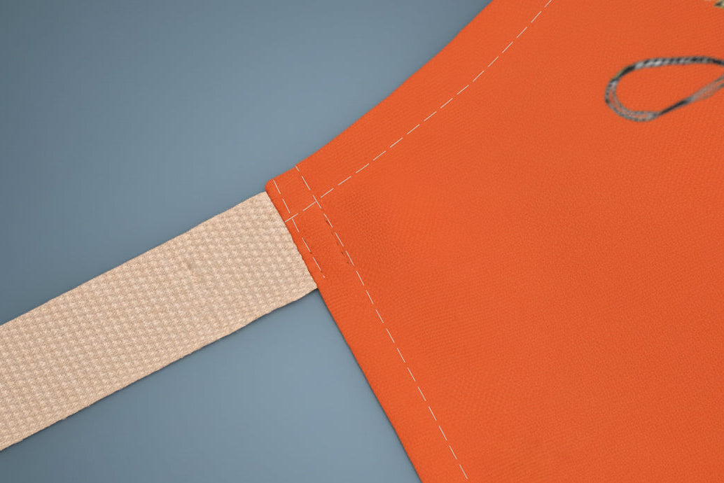 Orange apron with a pumpkin design with Beige Ties