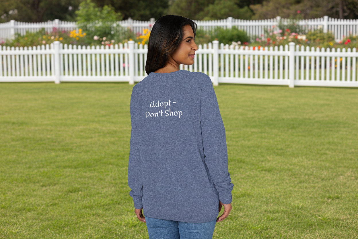 Person wearing a graphite heather shirt with 'adopt Don't Shop' text on the back.