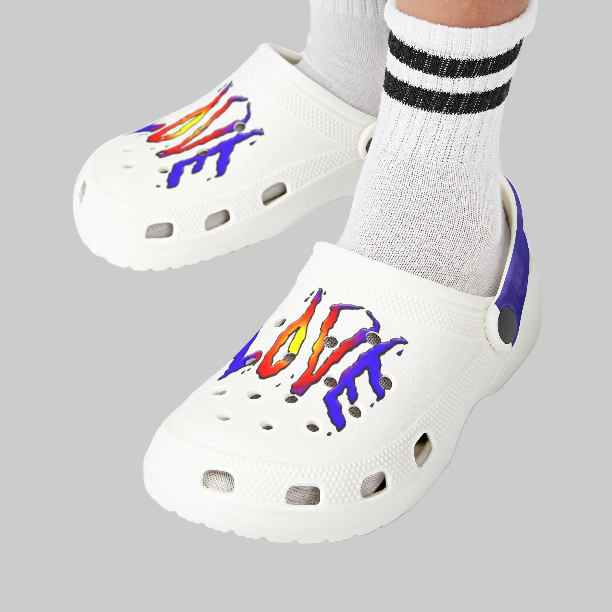 Colorful LOVE graphic on white kid's clog with blue heel strap they will want to live in