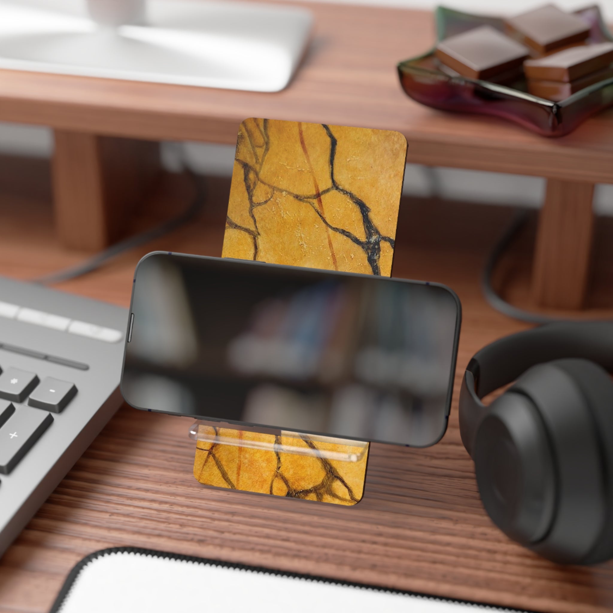 Phone stand in striking gold marble design fits anywhere - sturdy