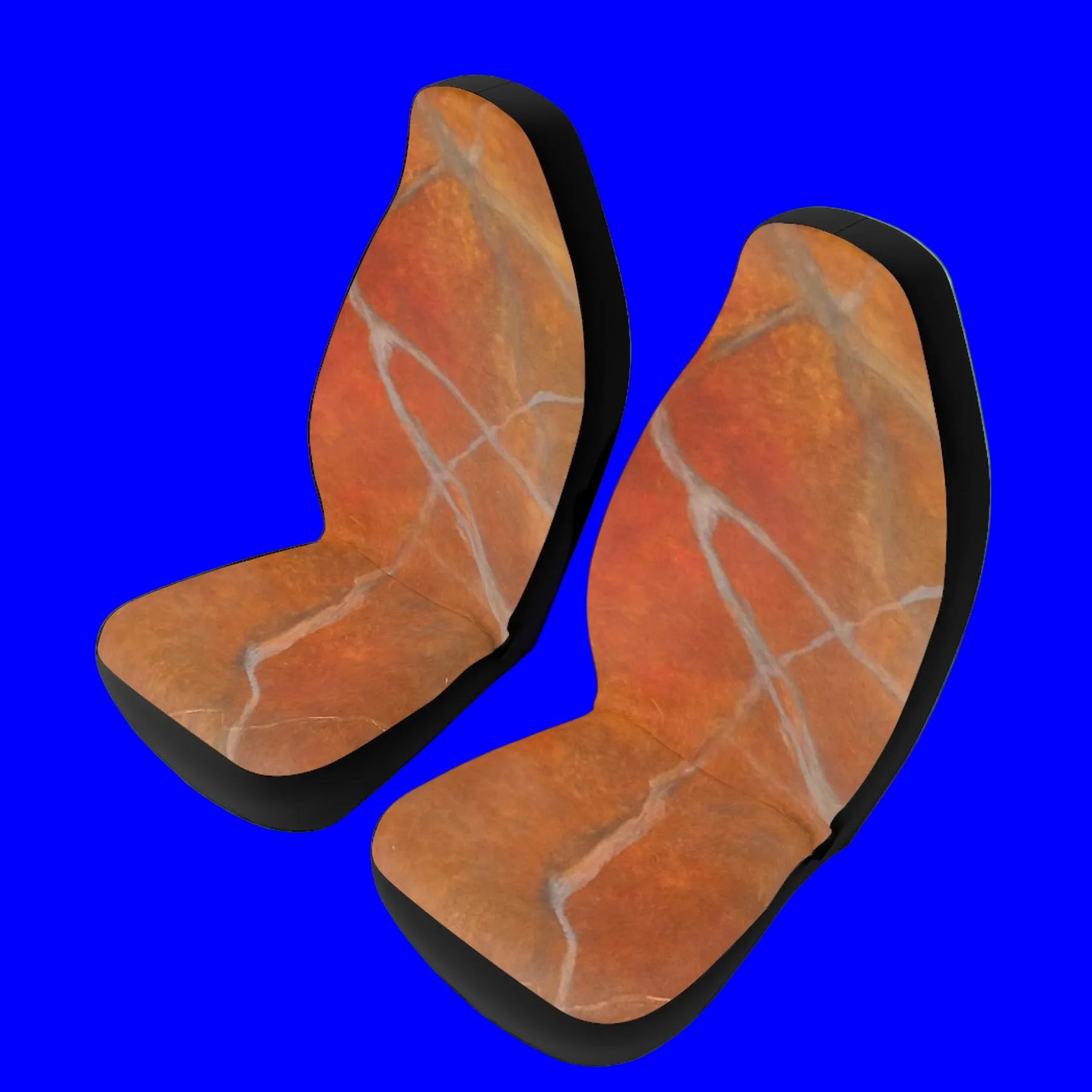 Pair of red/orange marble-patterned car seat covers 