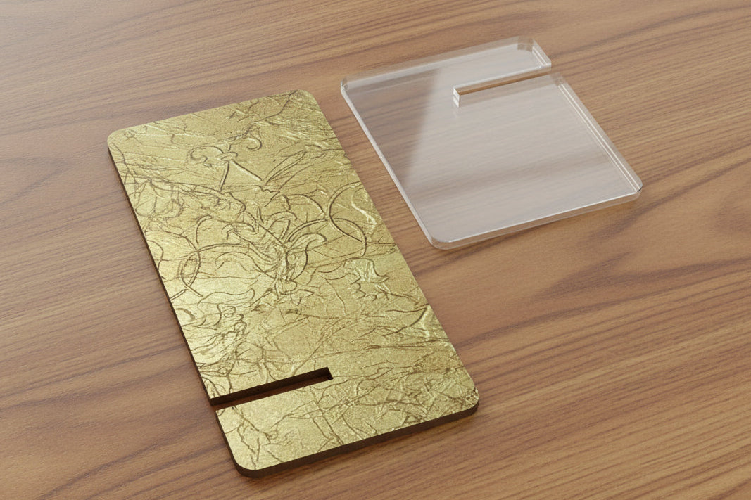 Embossed Gold phone stand sits disassembled for easy and fast assemblage