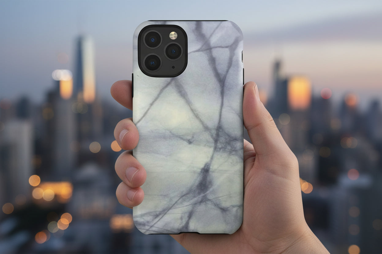 Phone case in impressive grey marble design with shock absorbing dual layer shell and UV resistance in 3D wrap