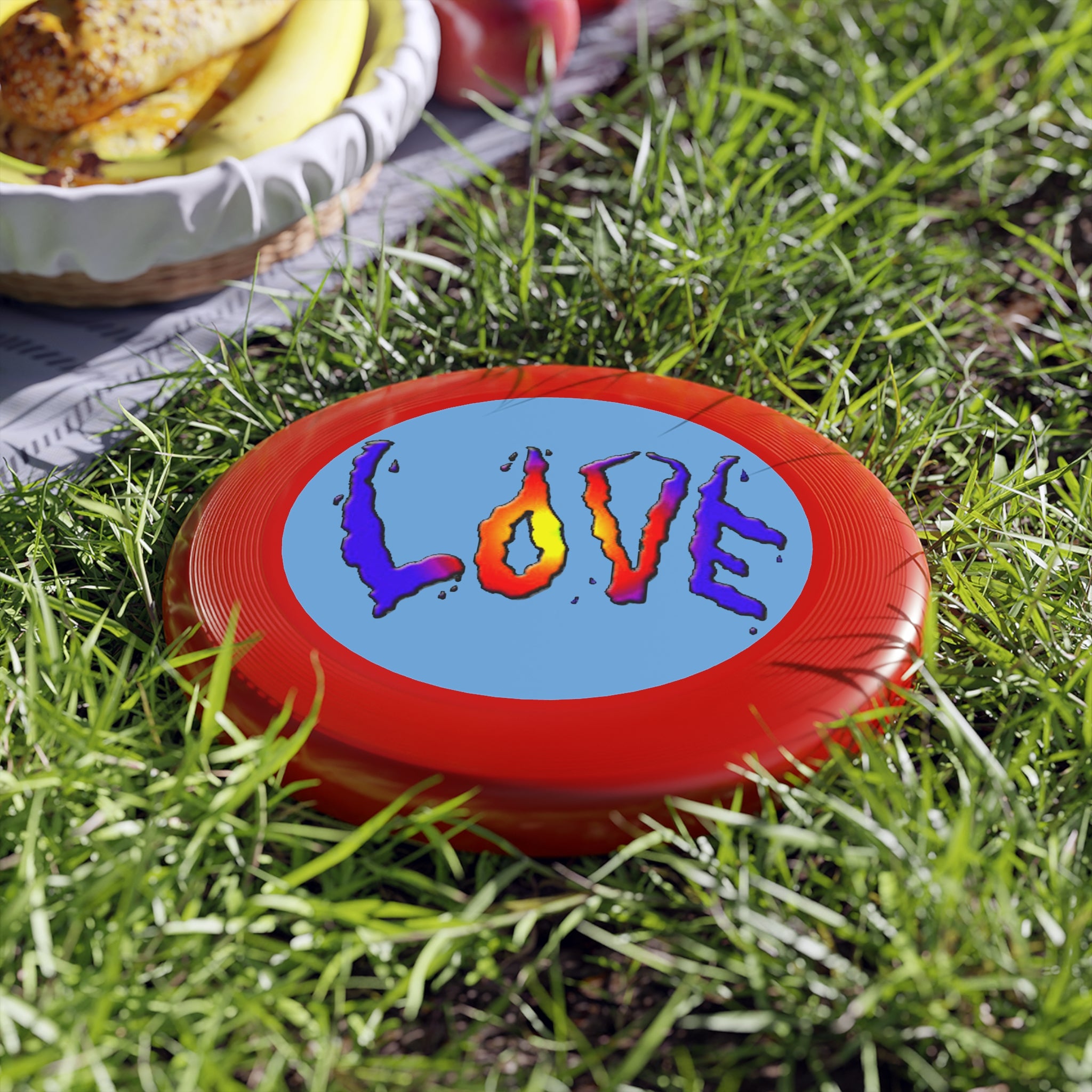 Red frisbee with unique painted 'LOVE' - great outdoor fun