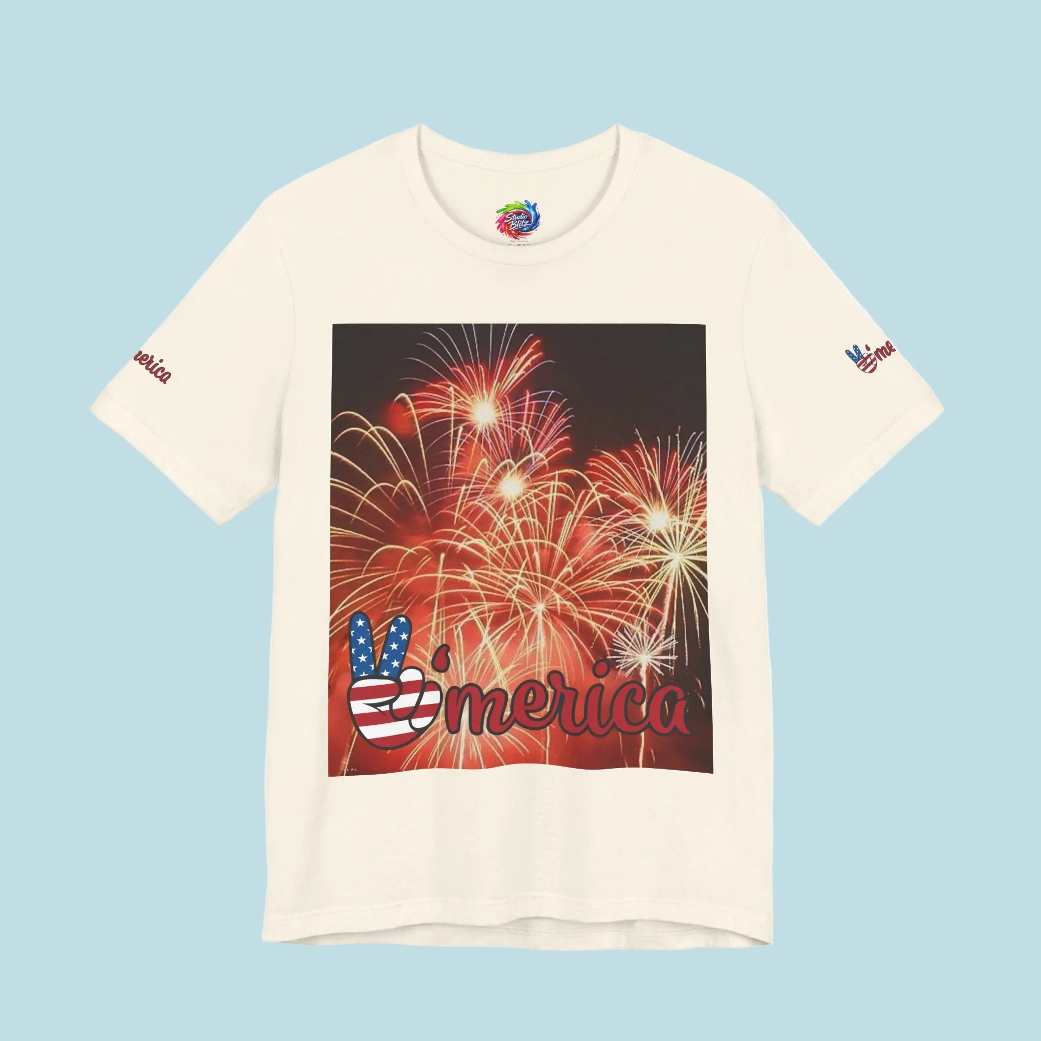 White t-shirt with a graphic of fireworks and 'Merica' text 
