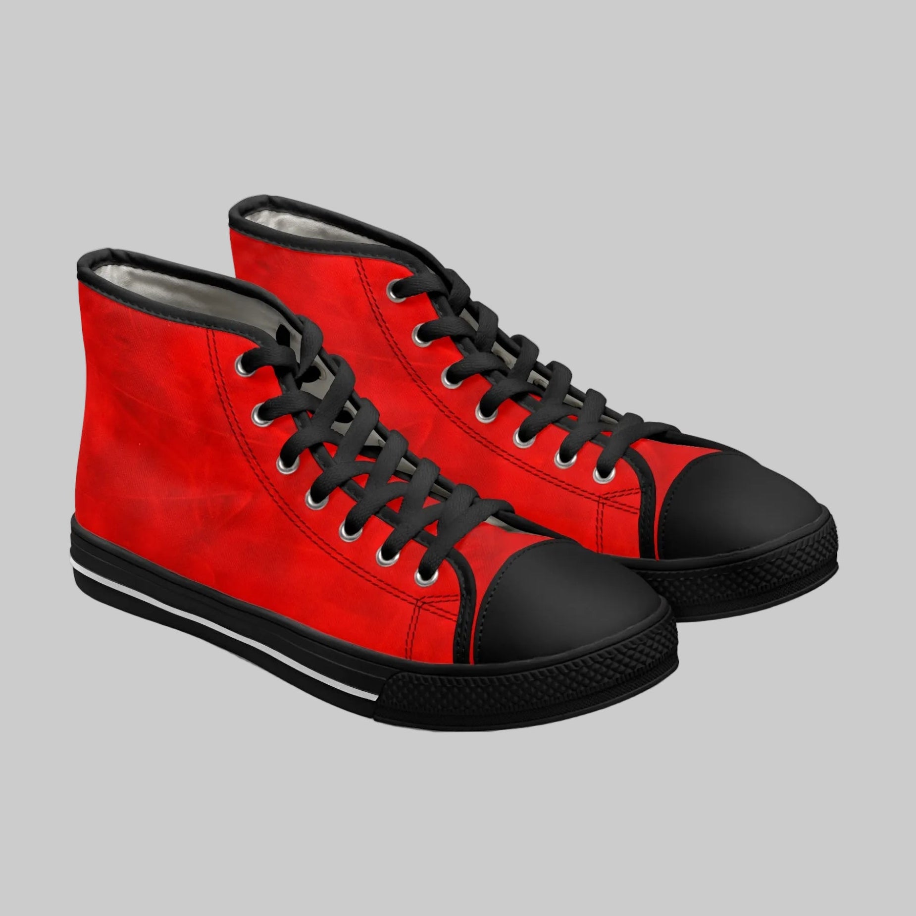 Women's high-top sneakers with an abstract vibrant red canvas upper and black details, including laces, toe caps, and soles