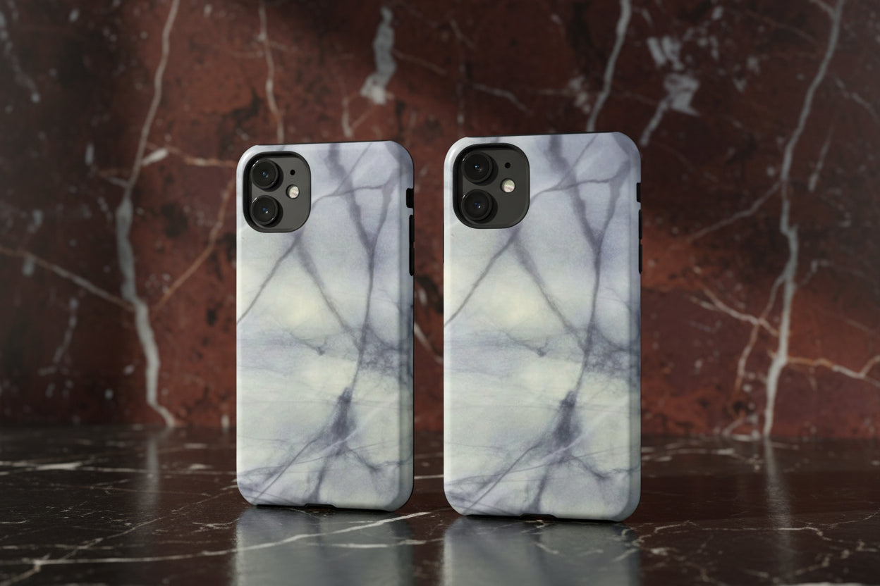 Phone case in impressive grey marble design with shock absorbing dual layer shell and UV resistance in 3D wrap