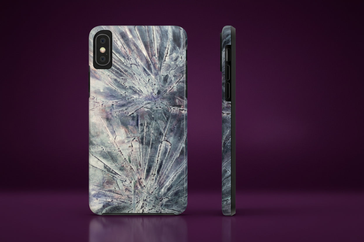 Phone case in abstract bursts of silver crystal design with rubber lining for strong impact and UV protection