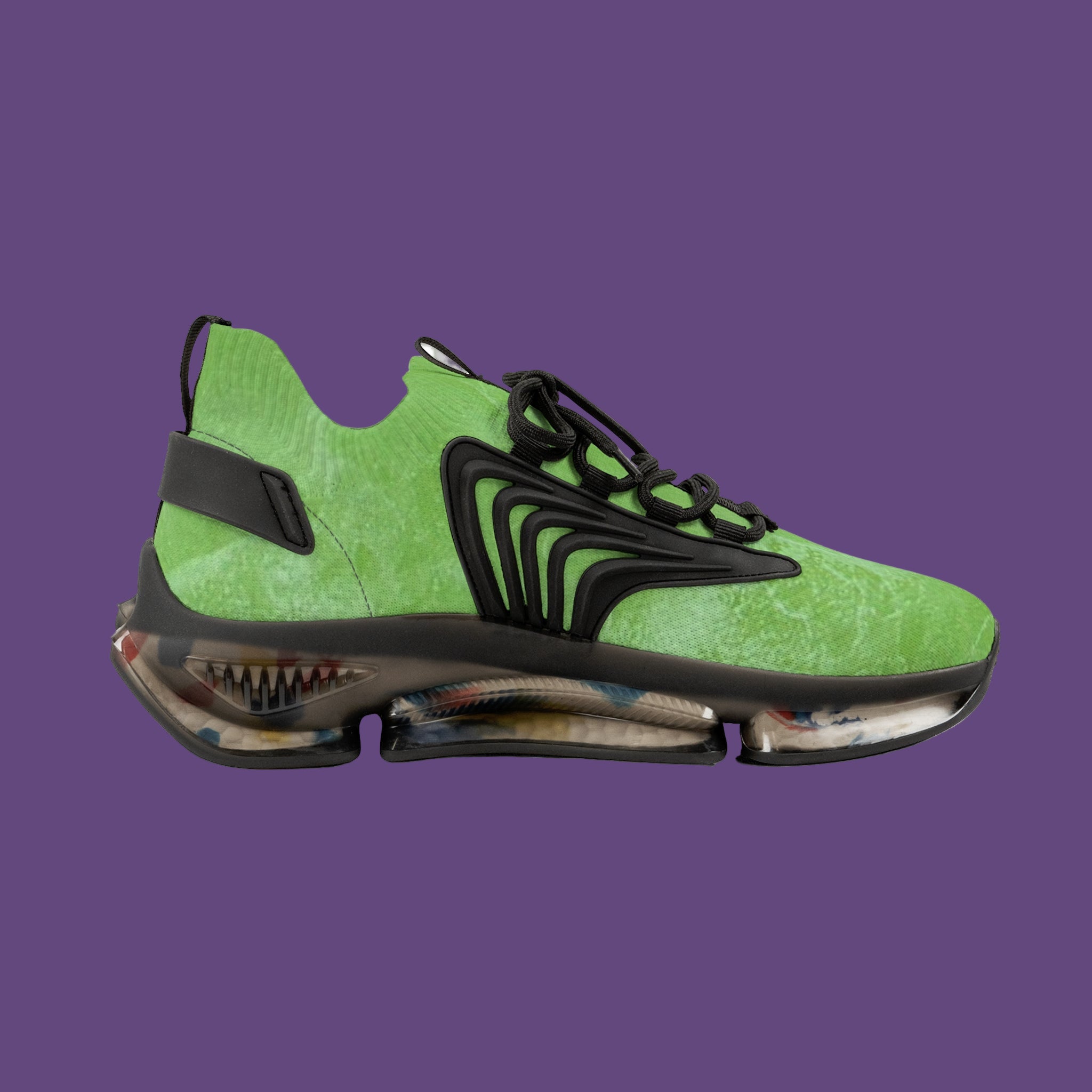 Green and black sneaker on a  purple background