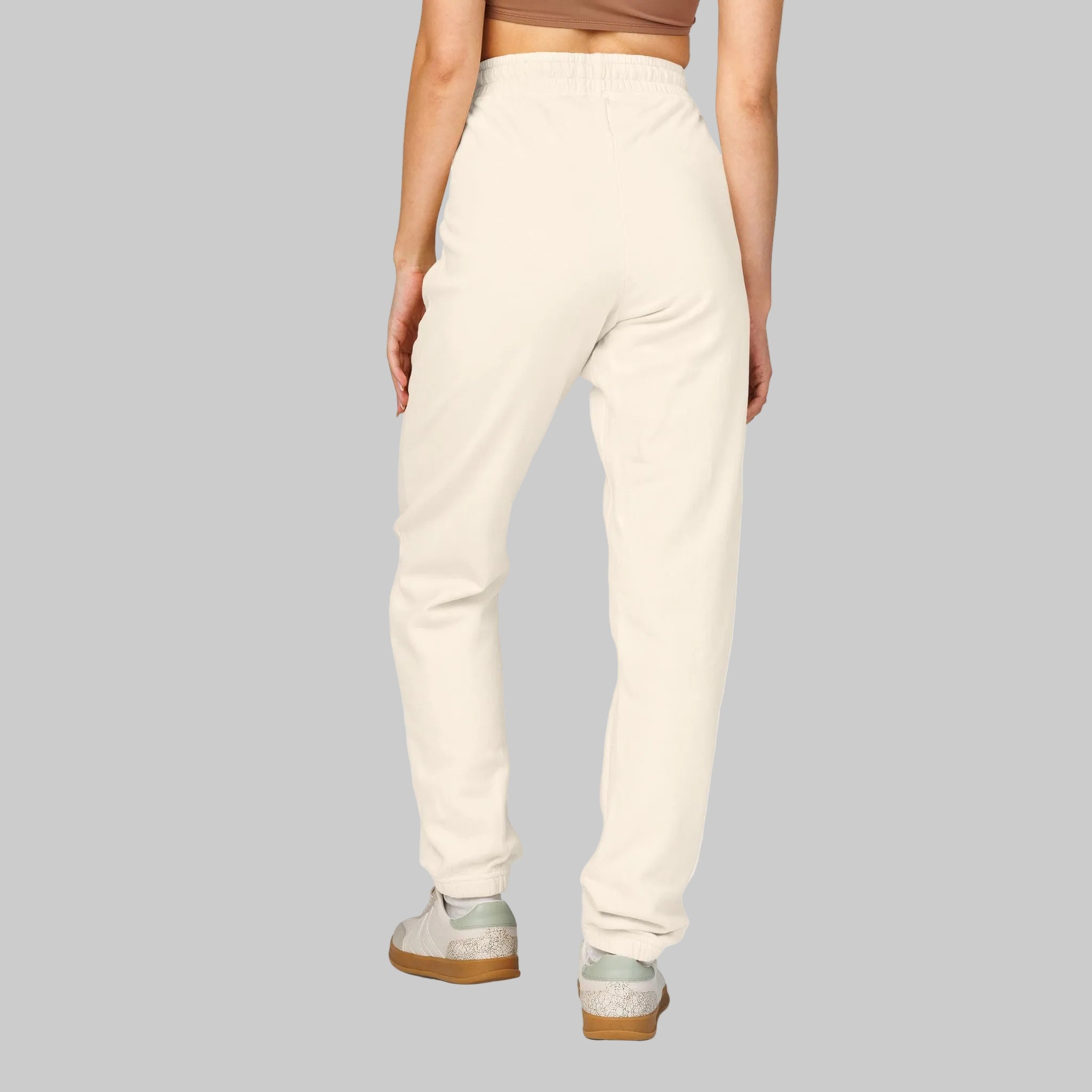 Ivory colored unisex sweatpants in soft, durable cotton for total relaxation 