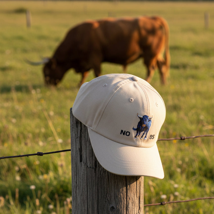 Khaki cap with bull graphic and 'NO BS' text 