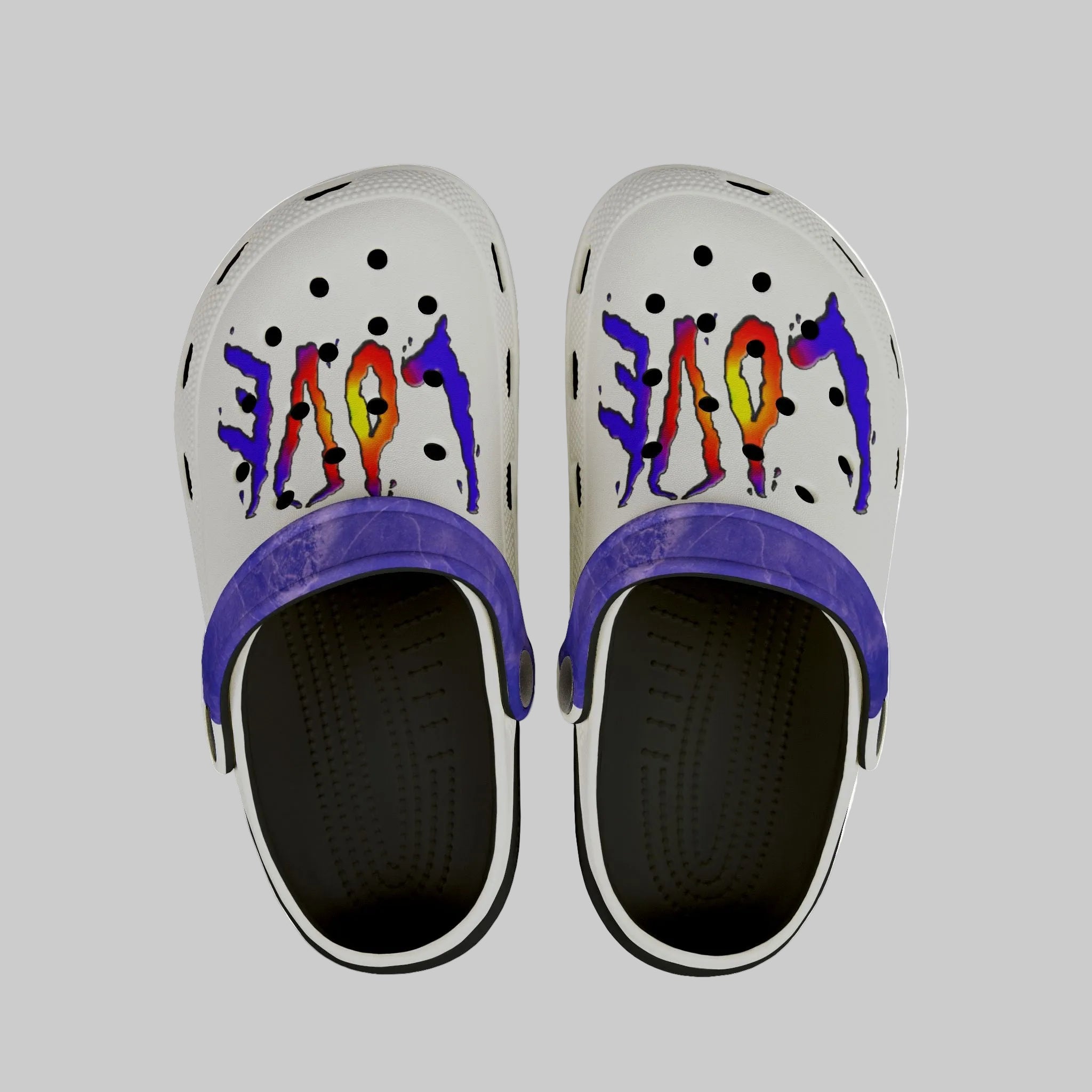 Flexible, comfy EVA Clogs for kids to wear all day in fun graphic colors and blue heel strap with black interior and footbed