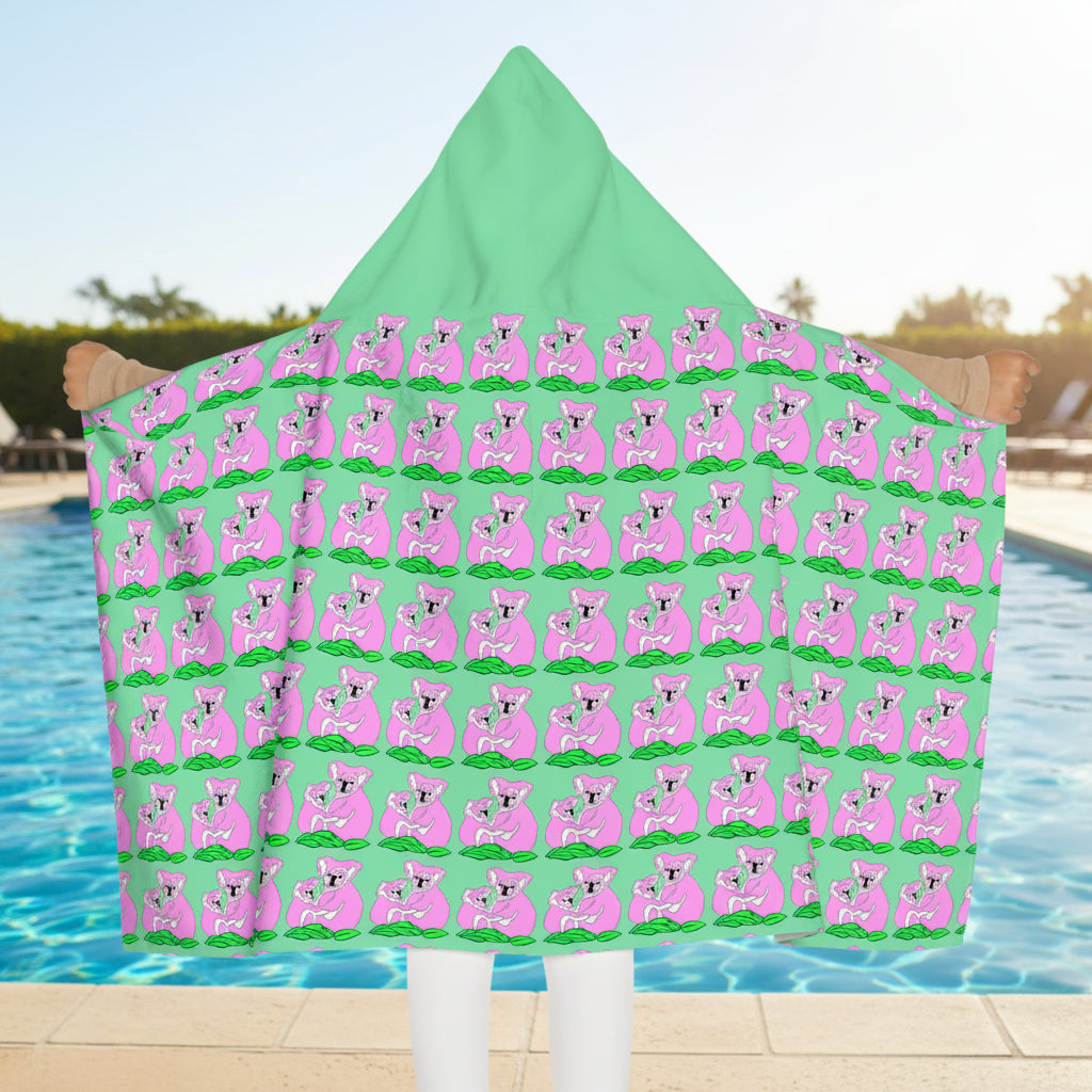All over print of pink Koalas on mint green for children at bath or beach