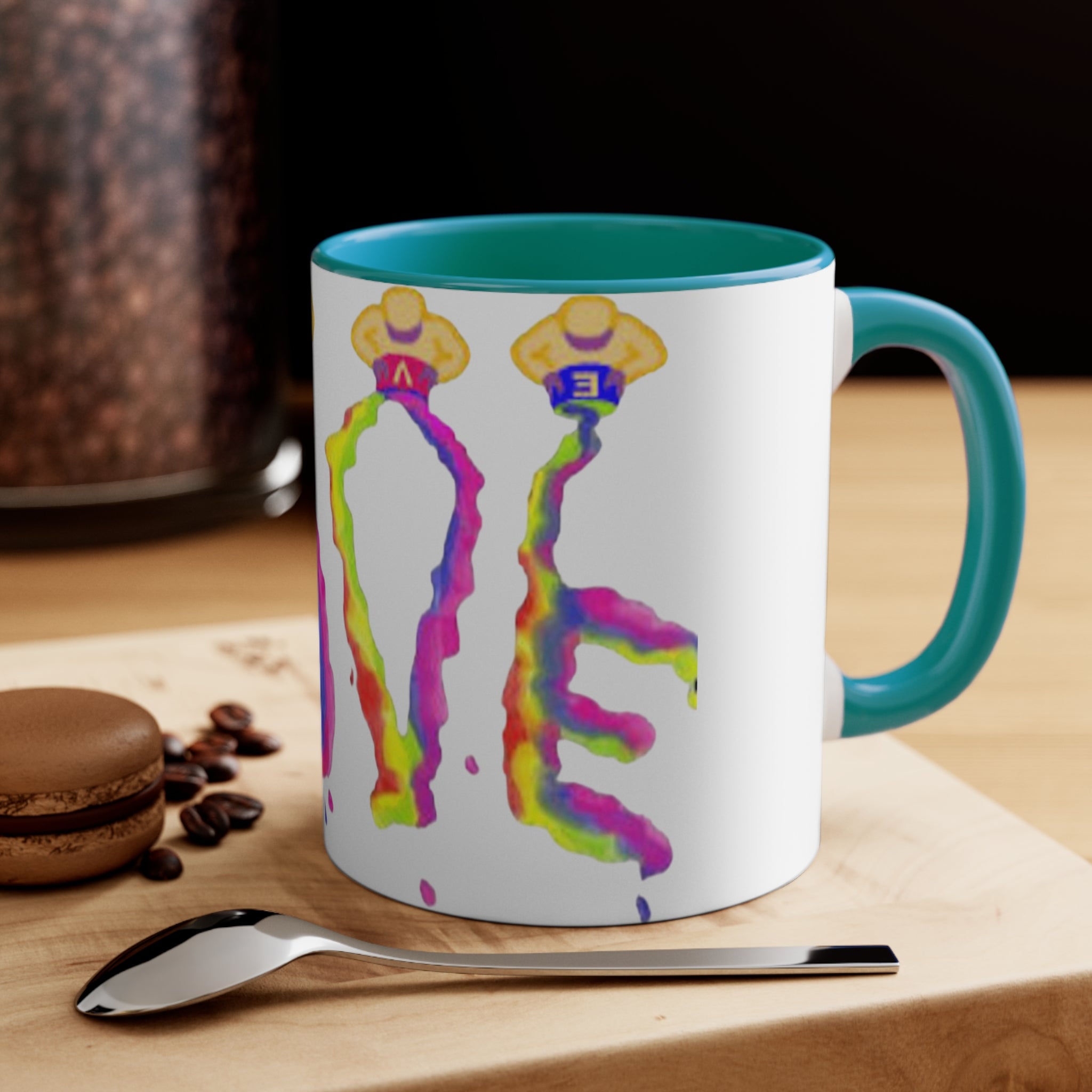 Mug with colorful LOVE design in green accents of handle and interior