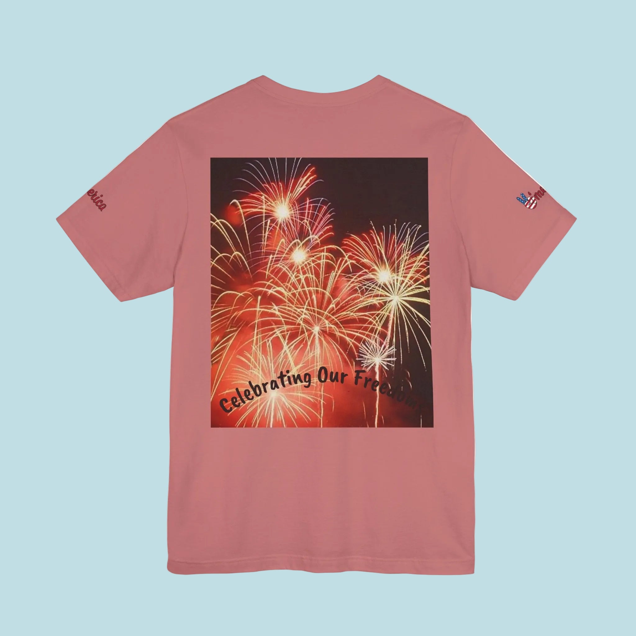 Mauve t-shirt with a fireworks design and text on the back