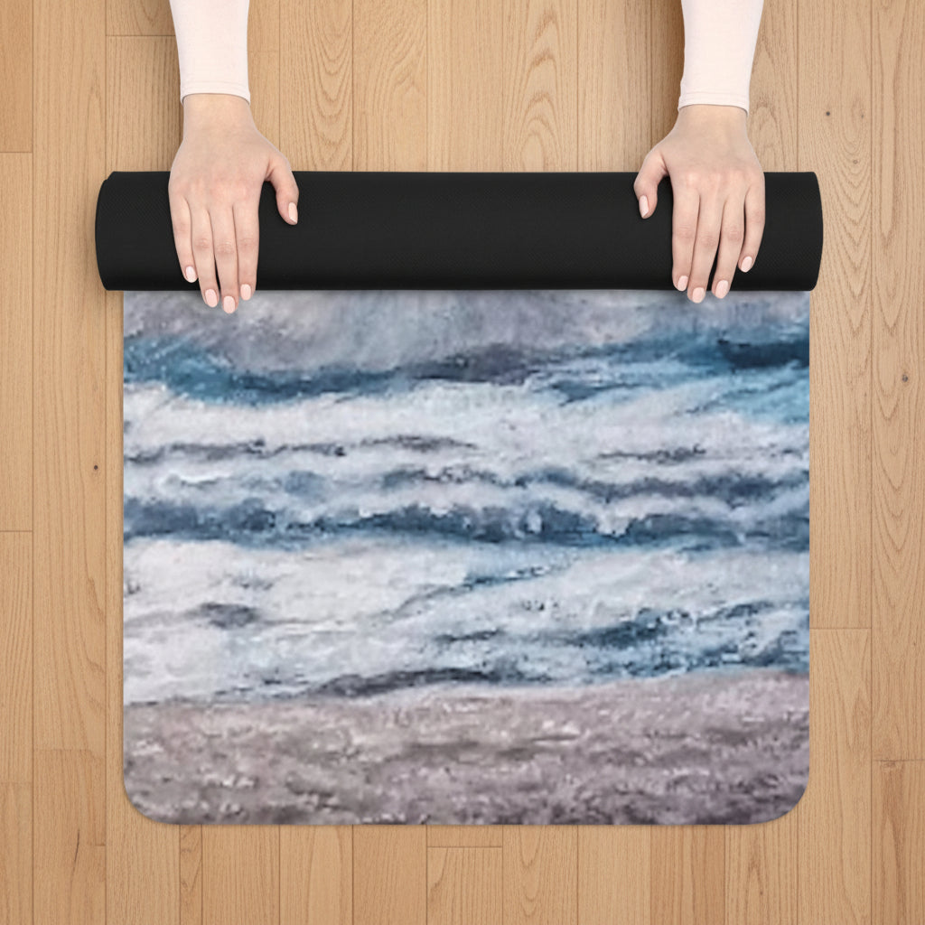 Yoga mat with a gorgeous beach ocean design being rolled up