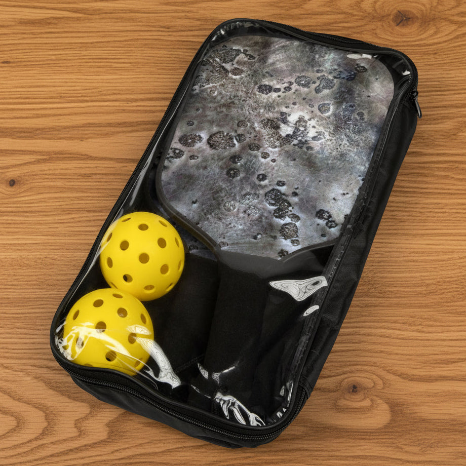 Black Pickleball carrying case with yellow balls shows Moon Rock Graphic on wood paddles for easy carrying