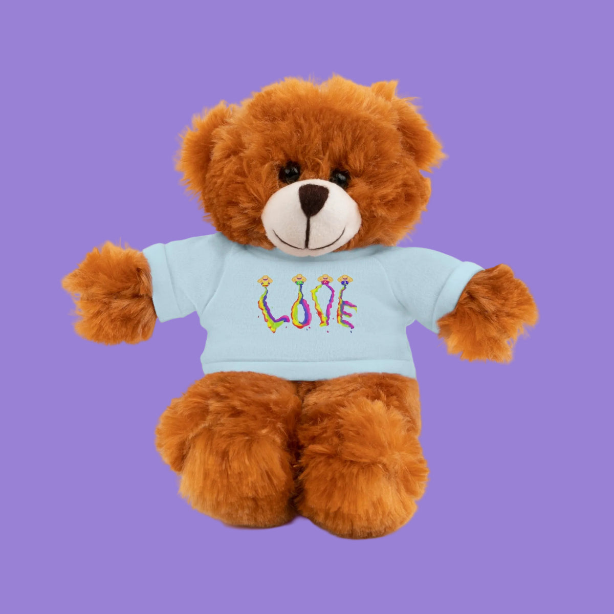 Brown teddy bear wearing a light blue shirt with a love graphic design 
