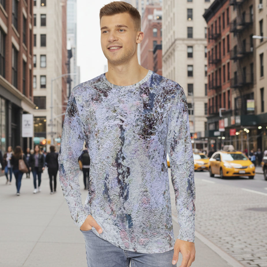Man wearing a long-sleeve shirt in grey and black abstract design