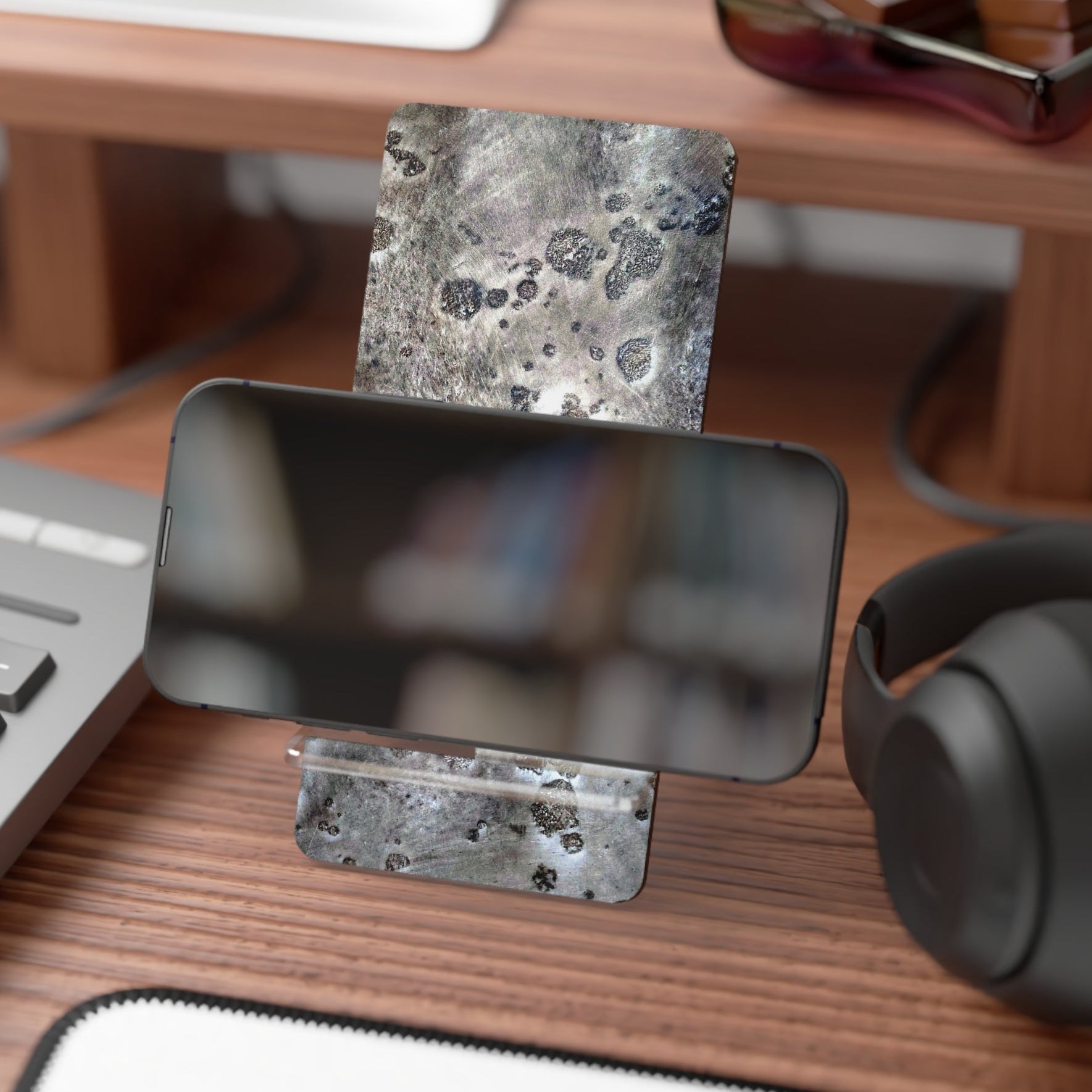 Moon Rock looking phone stand is not only eye catching but very sturdy and convenient