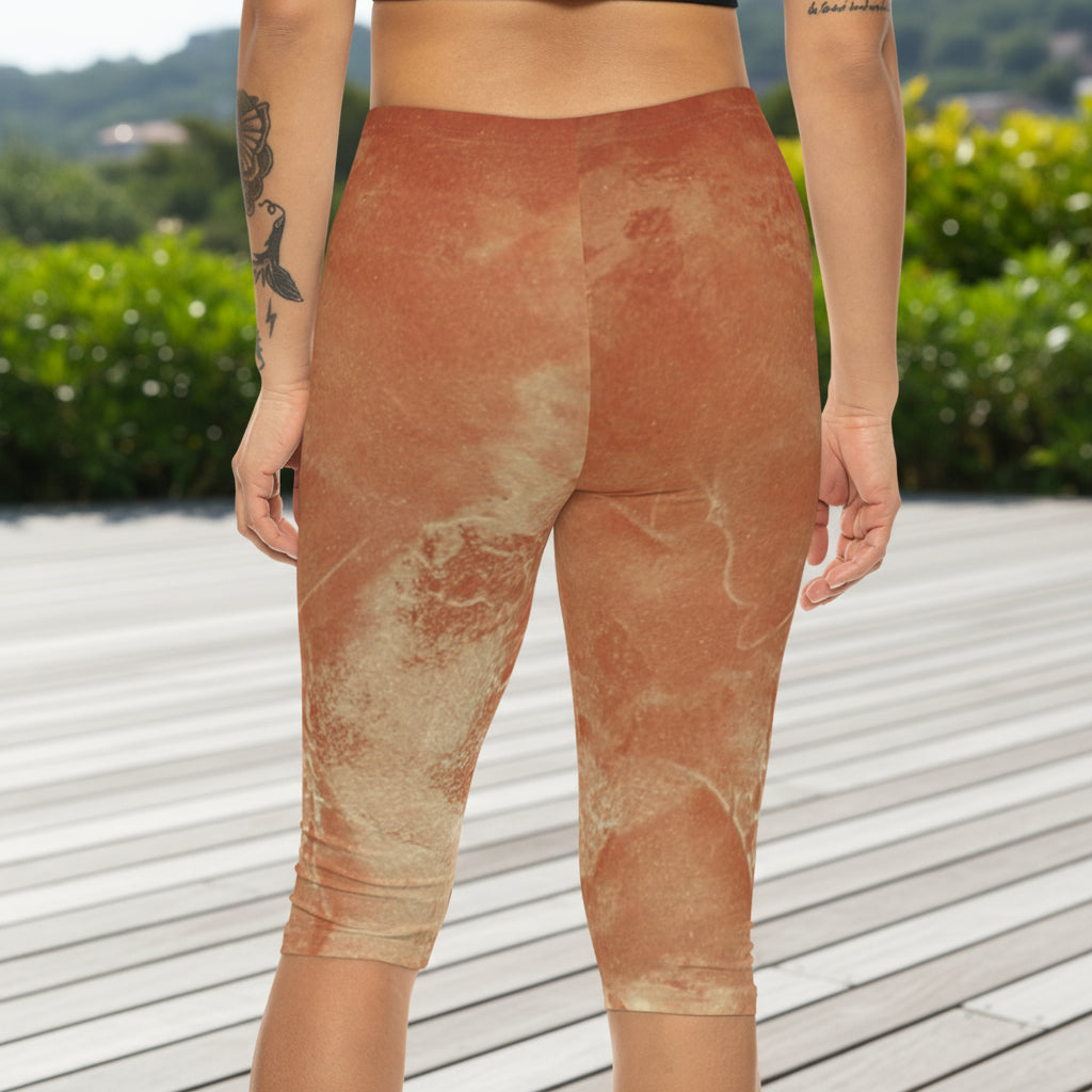 Brown textured leggings worn by a person on a white background