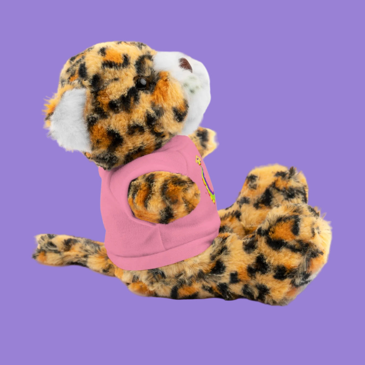 Plush toy jaguar and pink tee shirt in side view