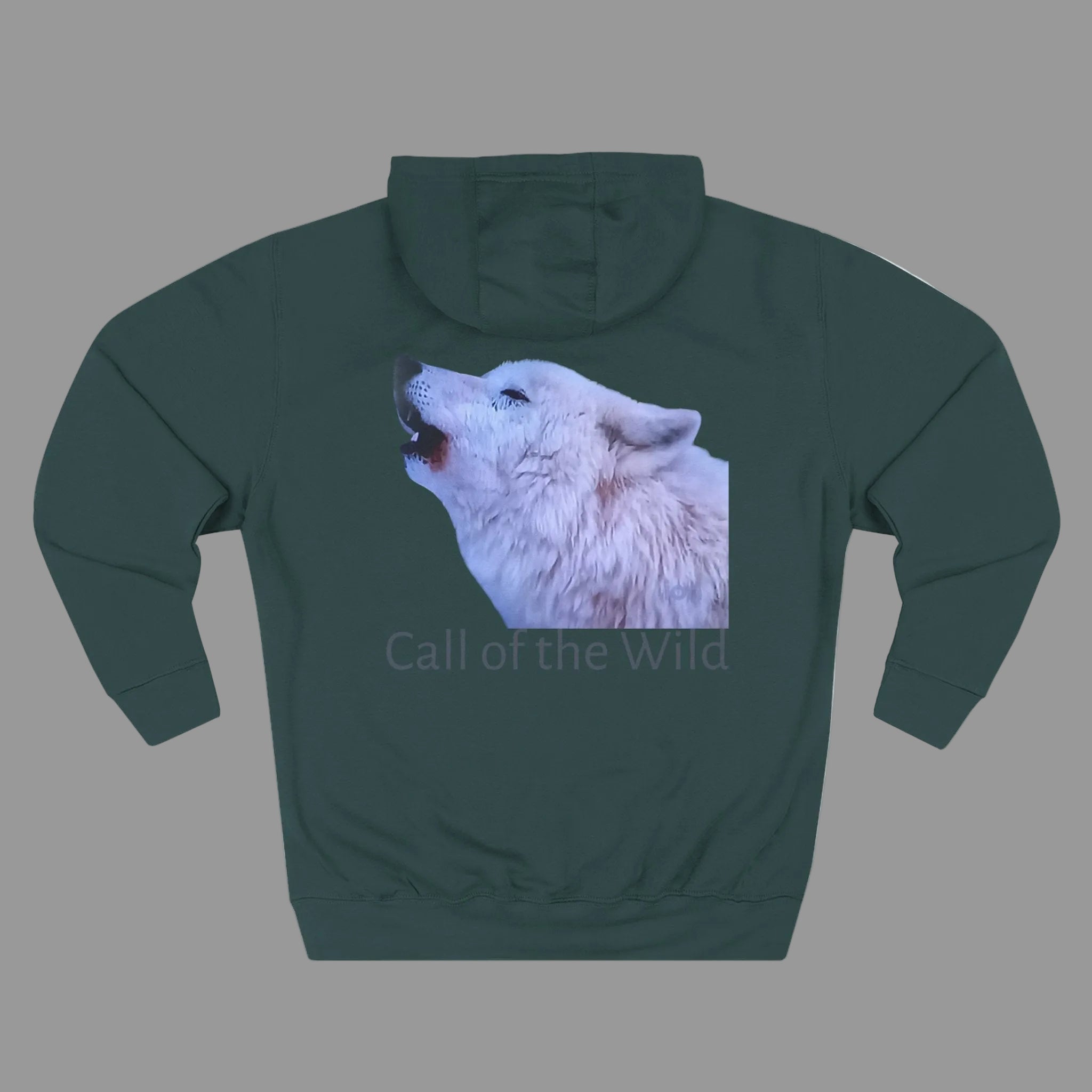 A dark green pullover hoodie shown from the back, featuring a graphic print of a white wolf howling with the text 'Call of the Wild' underneath.