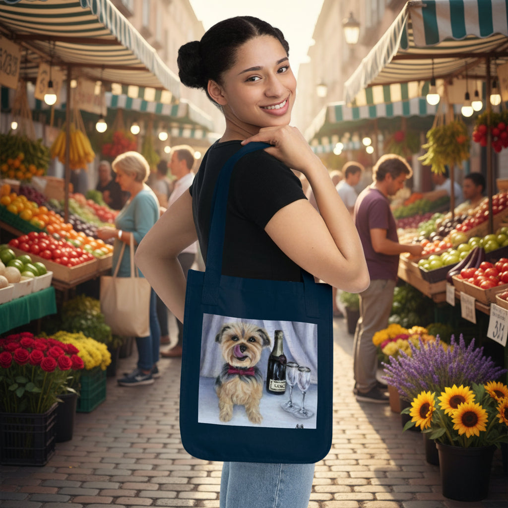 Cotton navy blue canvas tote bag features a printed graphic of a small tan dog sitting next to a wine bottle and a wine glass.